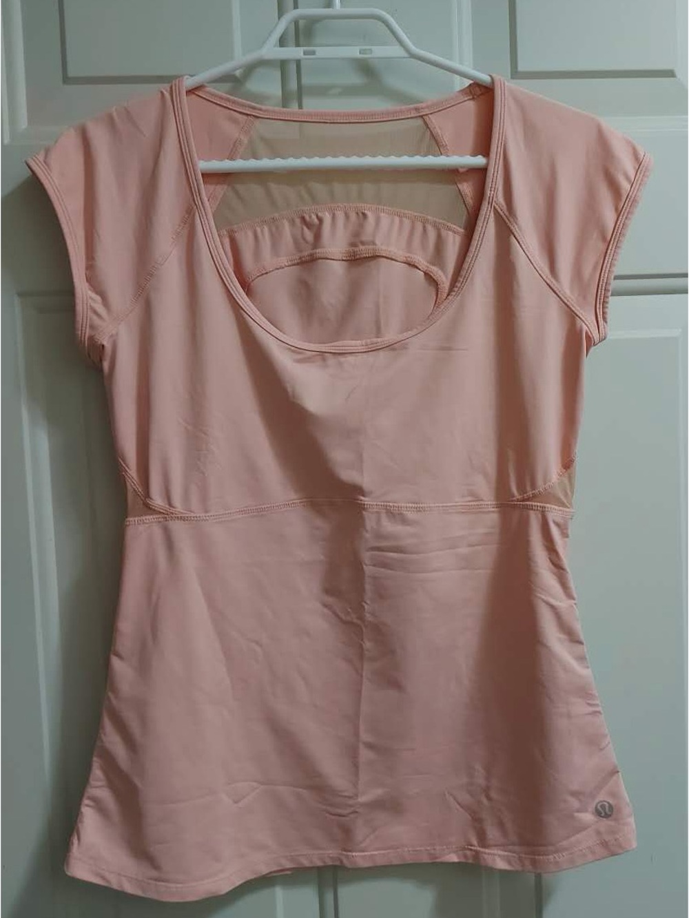 Lululemon pink short sleeve top with mesh inserts